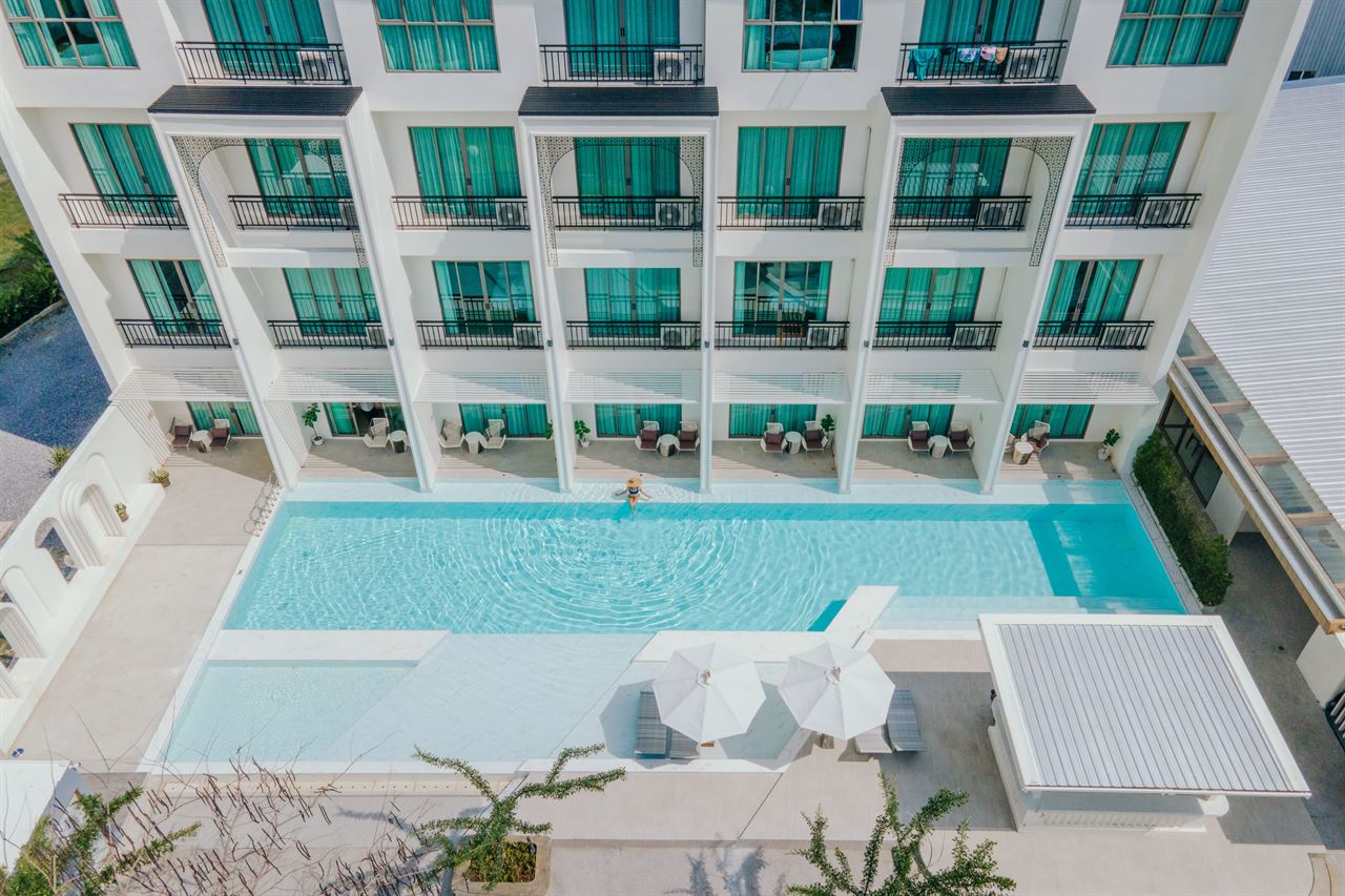 Parima Hotel building with balconies over the pool